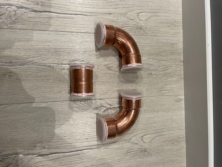 2 Kolana 90 stopni miedziane 54mm geberit i mufa 54mm geberit miedzia