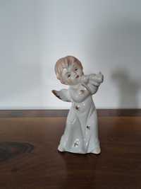 Porcelanowa figurka aniołka z trąbką