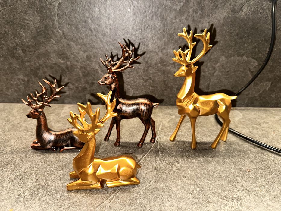 Świąteczny renifer złoty miedziany 4 sztuki glamour