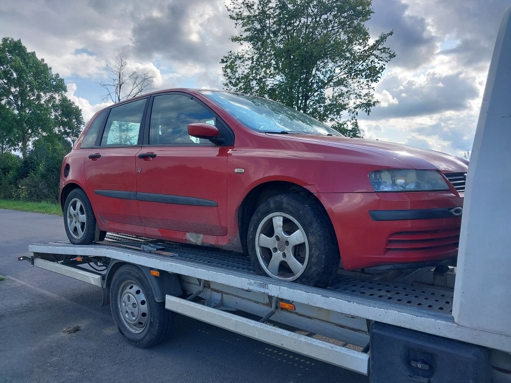 Części fiat stilo 1.9 jtd silnik skrzynia drzwi klapa szyba zderzak