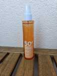 Clarins mgiełka do opalania ciała SPF 50+