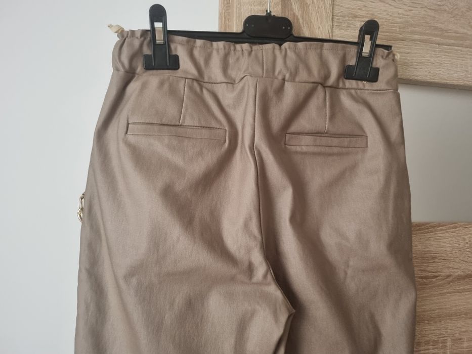 Spodnie woskowane Xana r.36/38, S, M piekny łancuch