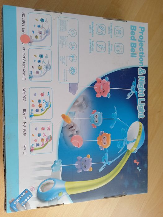 Мобіль музичний на ліжечко рожевий