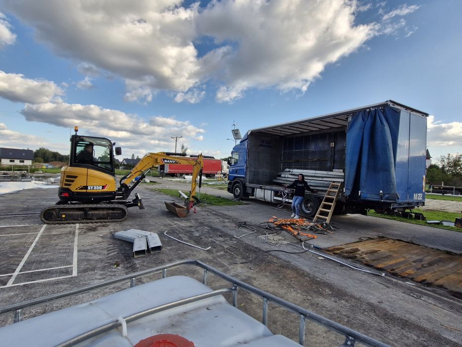 Transport krajowy i międzynarodowy maszyn oraz towarów( laweta,firanka
