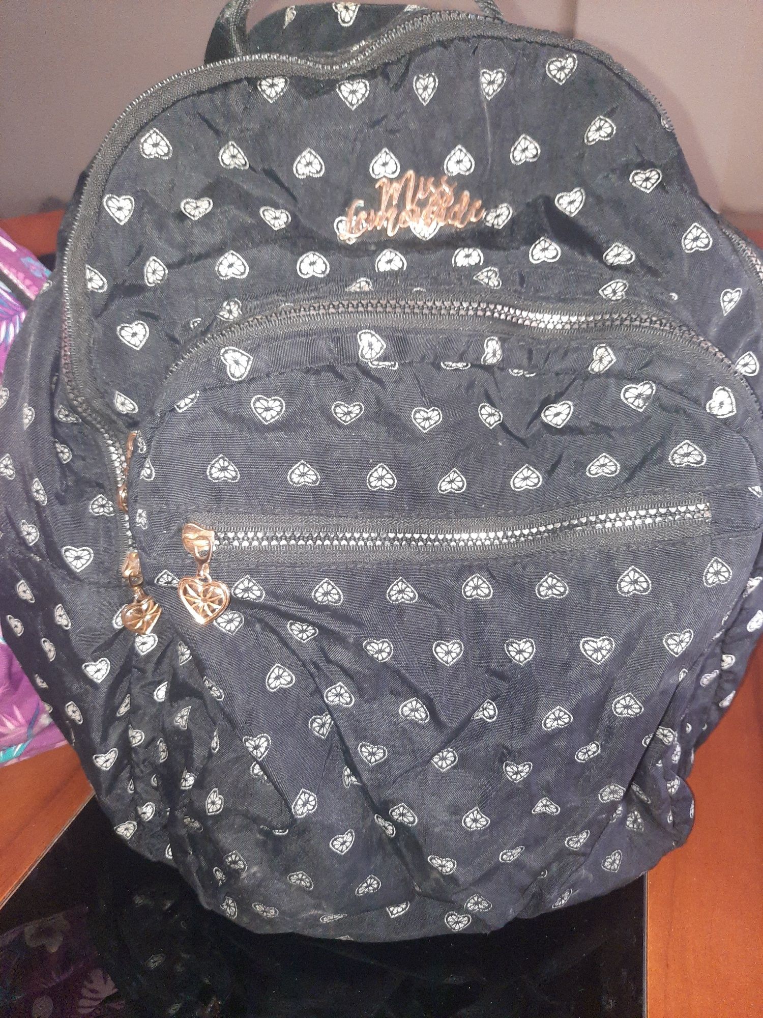 Mochila peta 3 bolsas