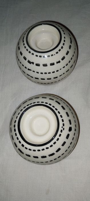 2 castiçais em louça