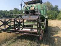 Комбайн John Deere 1032.