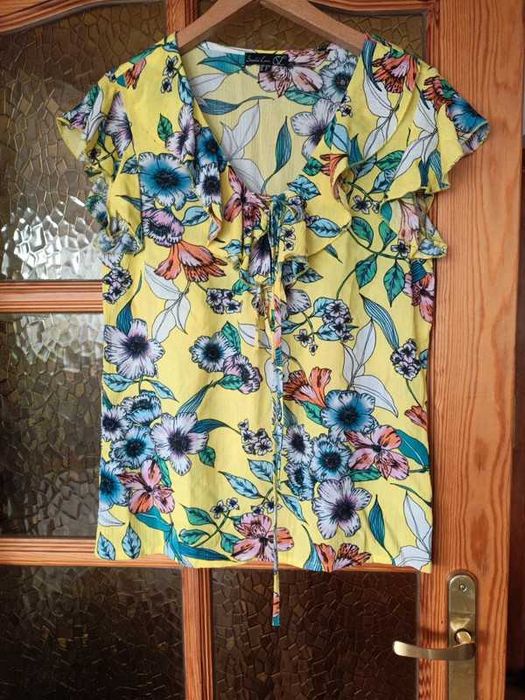 Żółta bluzka w kwiaty damska z falbanką