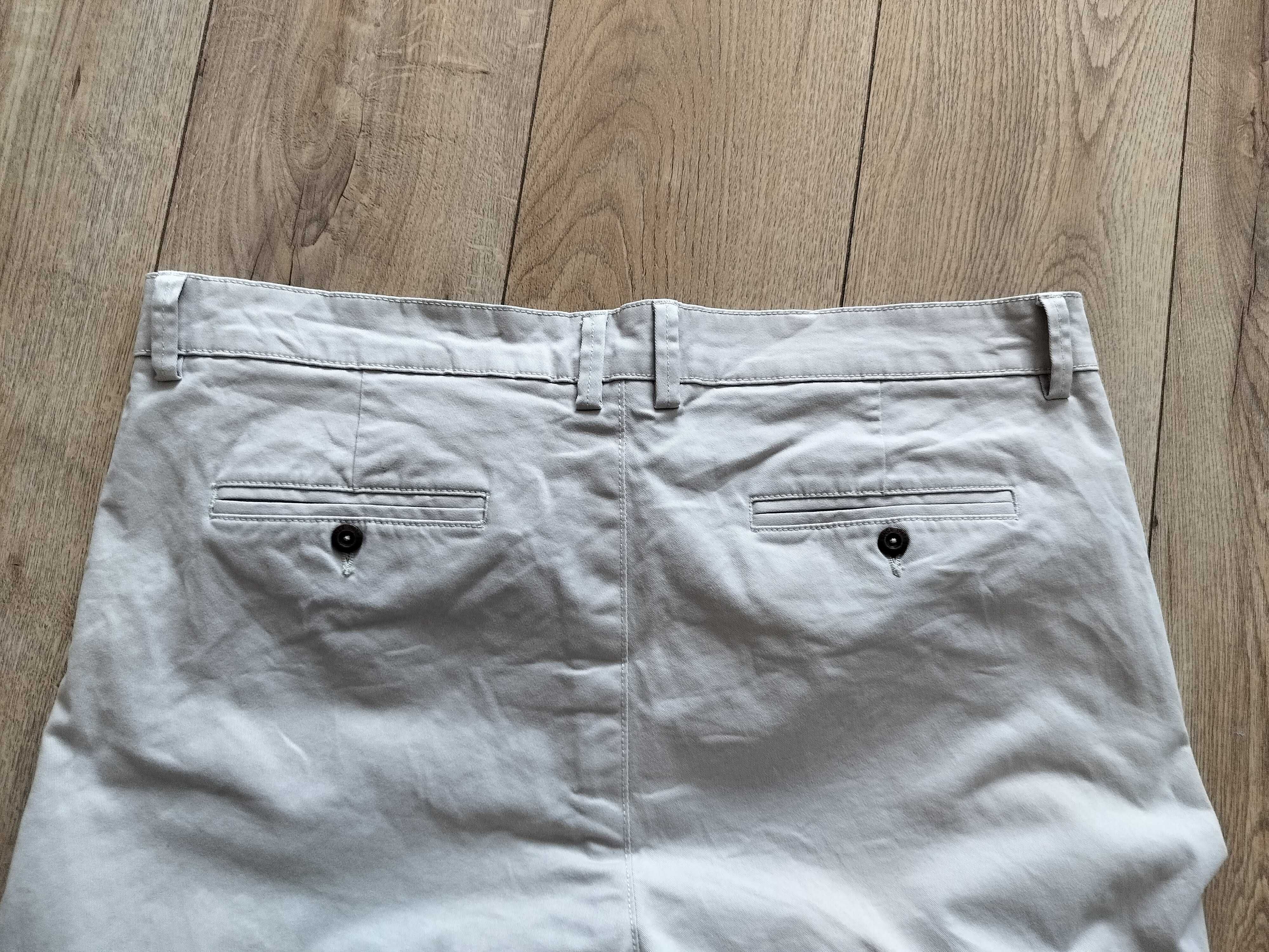 Spodnie męskie 42/32 slim fit oryginalne beżowe elastyczne pas110
