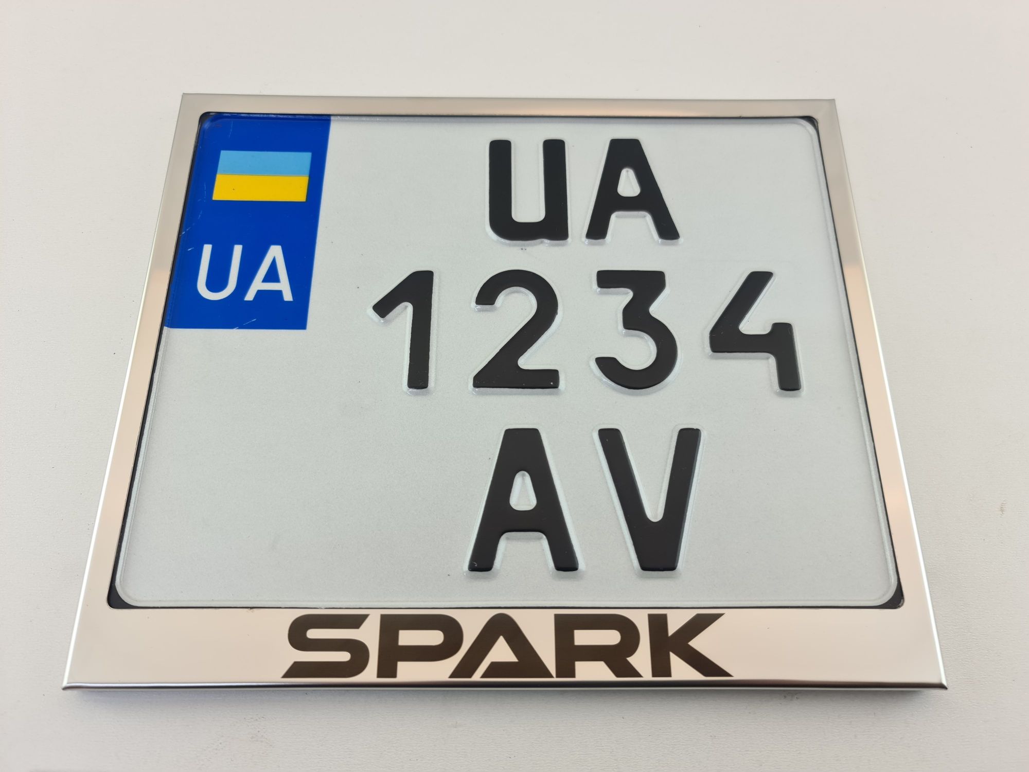 Рамка для мото номера Украины с надписью SPARK зеркальная нержавейка