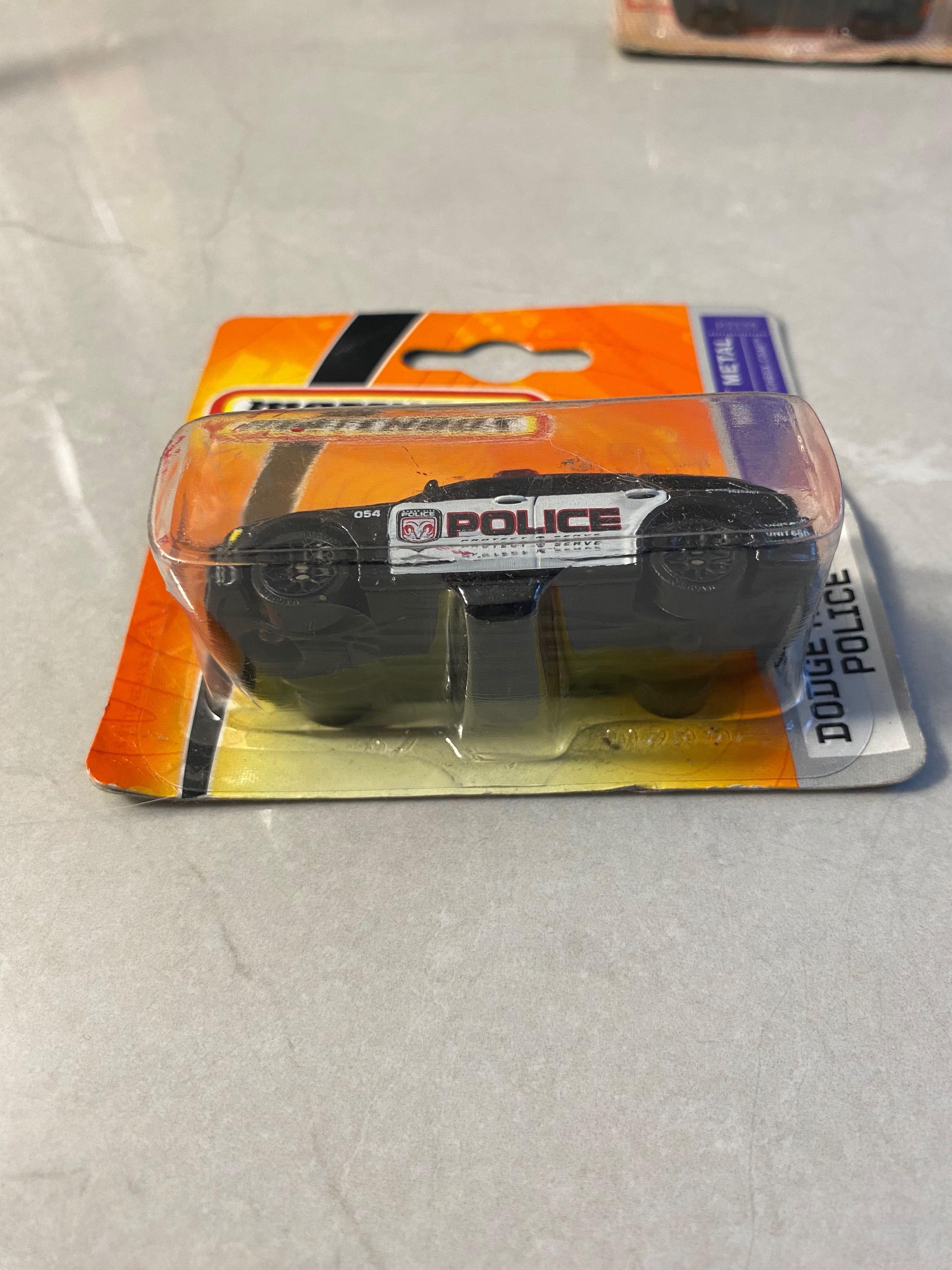 Matchbox Dodge Magnum Police policyjny krótka karta