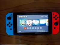 Nintendo Switch com 3 jogos e 1 comando extra