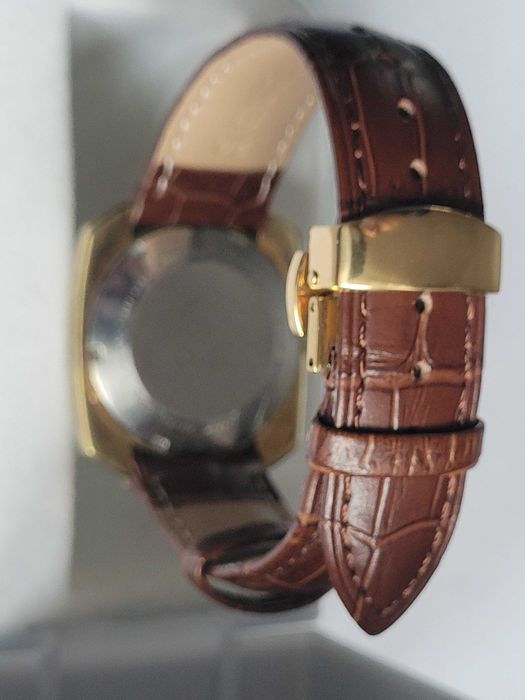 Pozłacany zegarek Mondia z tzw. bijącym sercem + gratis zegarek LCD.