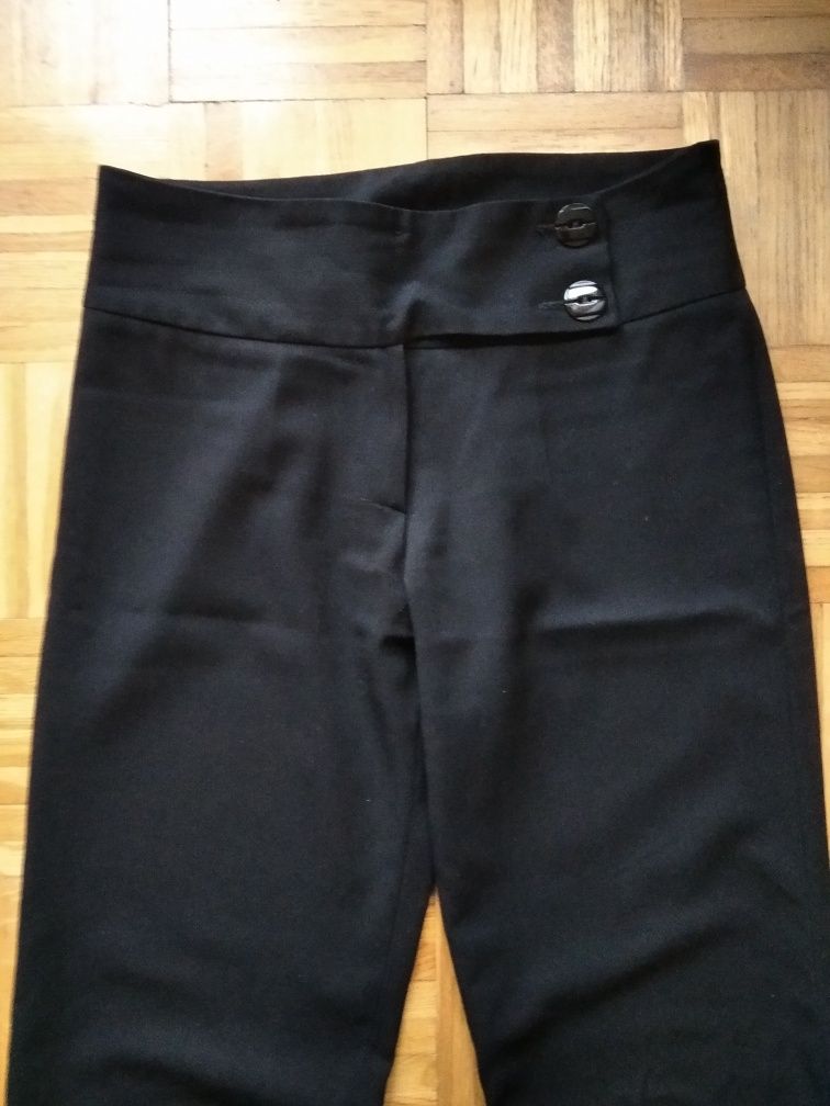 Czarne eleganckie spodnie prosta szeroka nogawka.