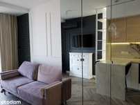 Klimatyzowany apartament z parkingiem