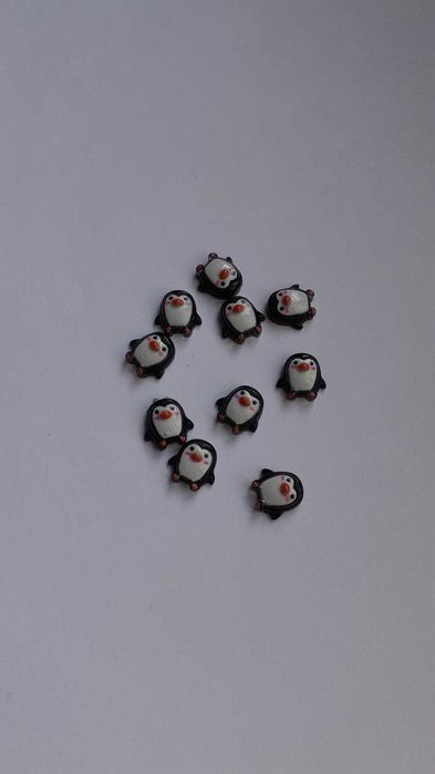 Pinguins em resina miniatura