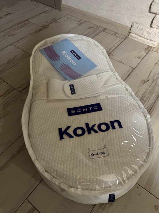 Продам комплект Sonto: кокон + дихаючі бортики в ліжечко