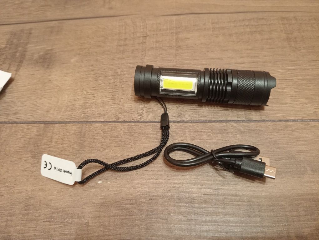 Ergonomiczna latarka z zoomem optycznym