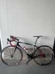 Bicicleta de ciclismo Moser 111 em carbono.