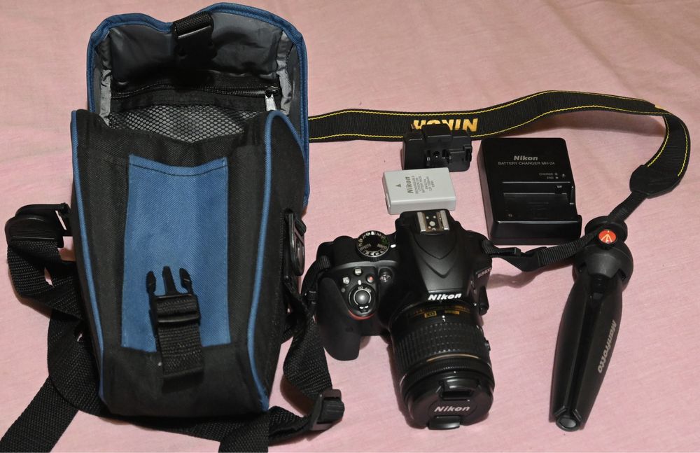 Nikon D3400, lentes 18-55, 35mm e 55-200,  tripé e bolsa