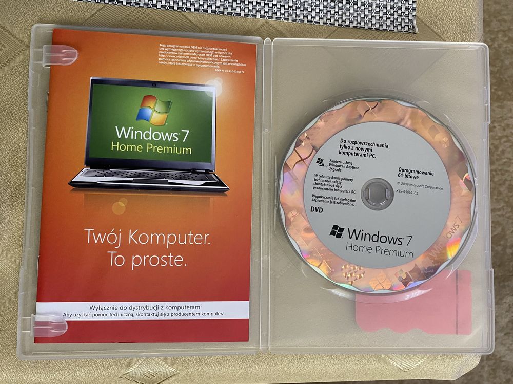Windows 7 Home Premium 64-bit - naklejka lic na pudełku