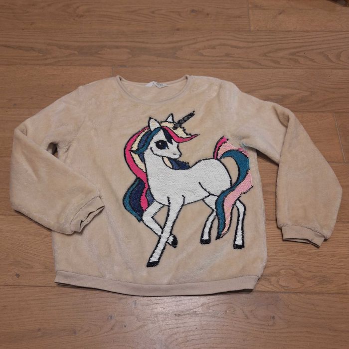 Puszysta włochata beżowa bluza H&M cekiny jednorożec 134/140, 8-10 lat