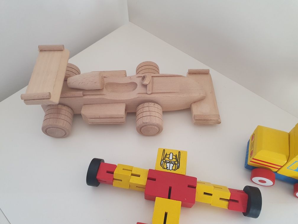 Drewniane zabawki pociąg ciuchci wyścigowka koparka robot transformers