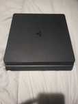 PS4 SLIM 1TB + Cabo de alimentação + 2 comandos + GTA 5