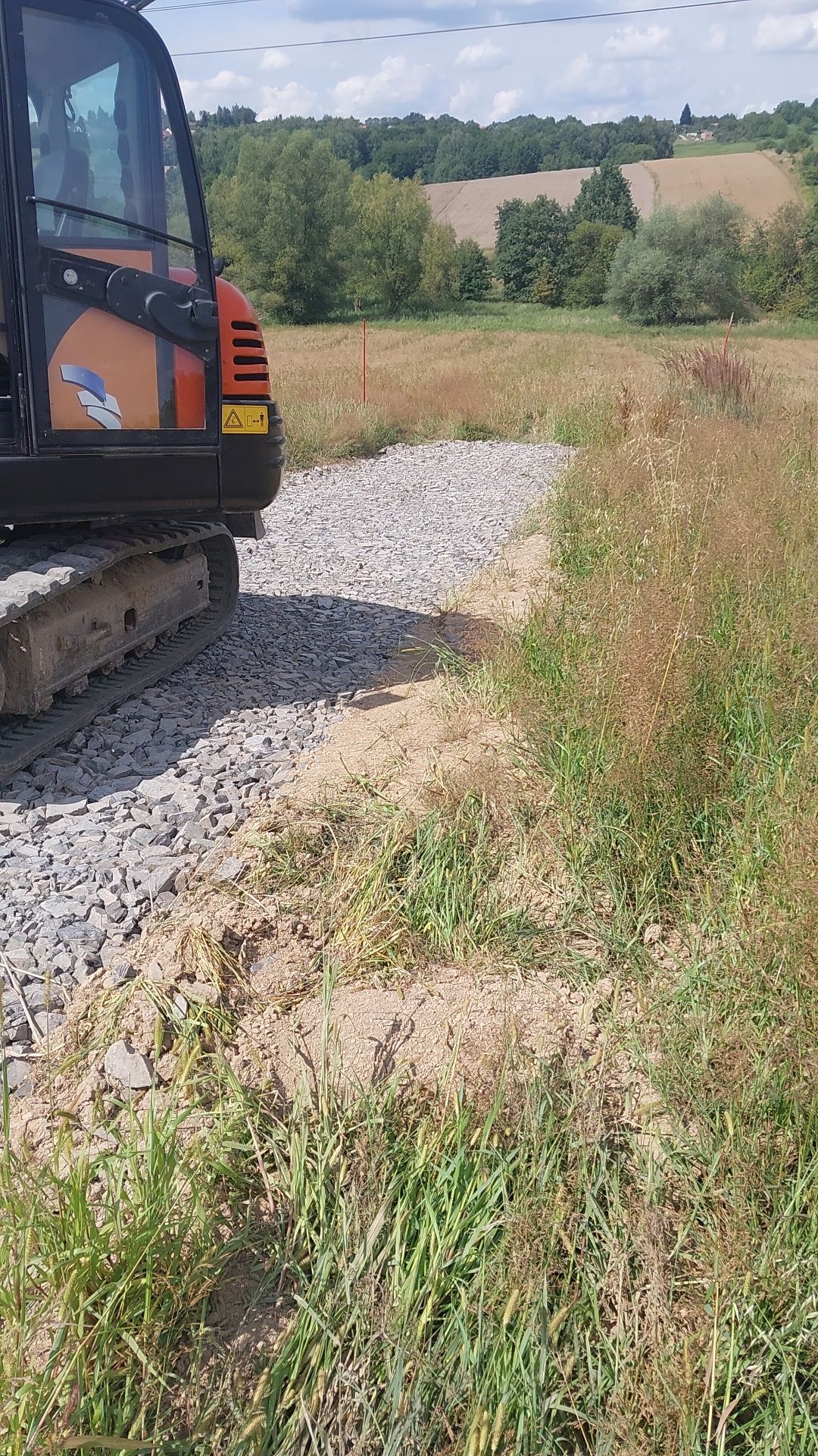 Usługi koparkami z młotem transport spycharka