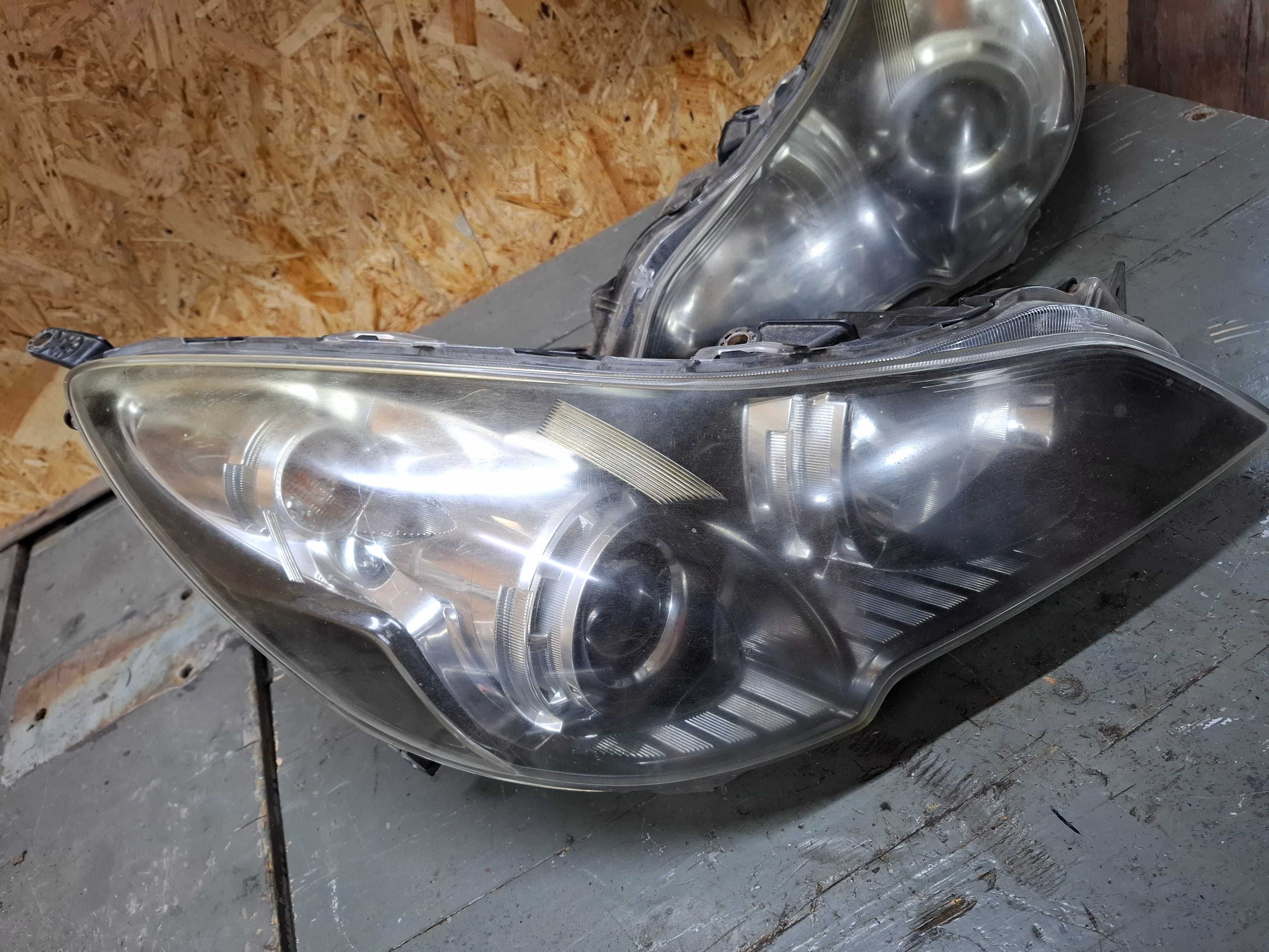 lampa przód przednia lewa lub prawa xenon subaru legacy V 5 outback 09