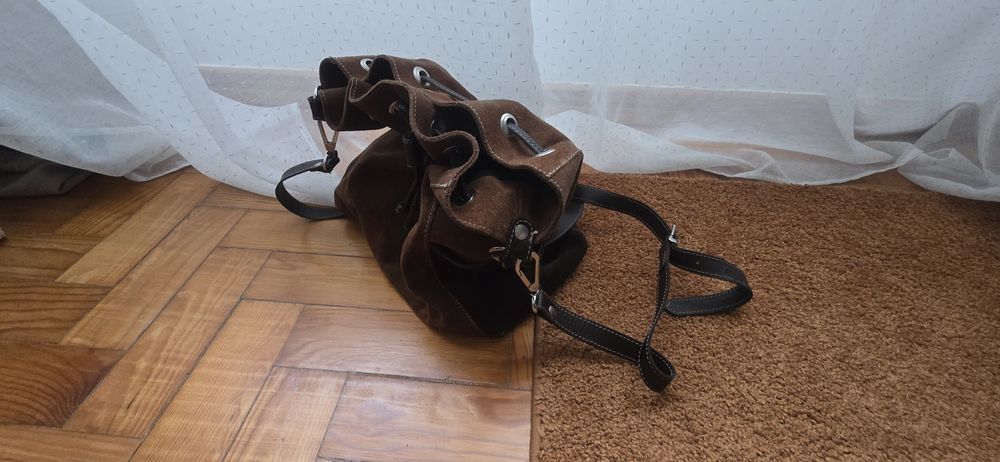 Mala castanha em pele