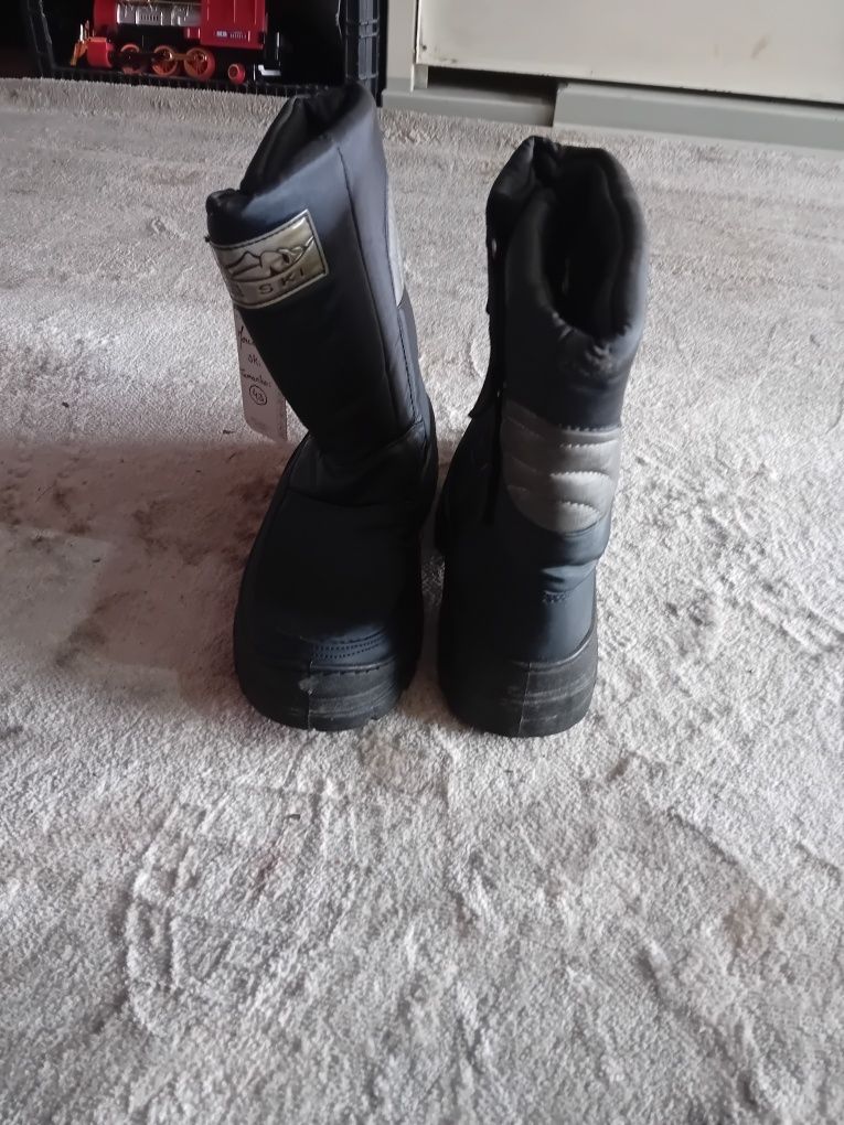 Botas de neve  .