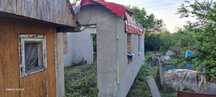 Земельна ділянка з недобудованим будинком