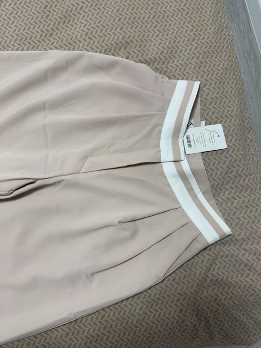Штани нові С-М бежеві