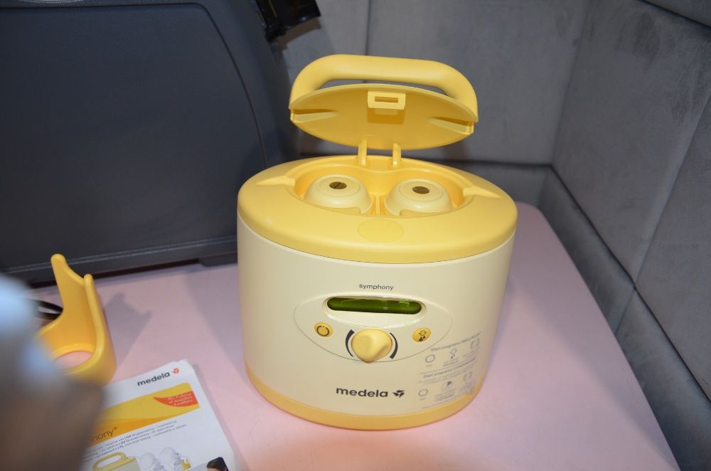 MEDELA + SKRZYNKA sprzedam laktator/odciągacz symphony
