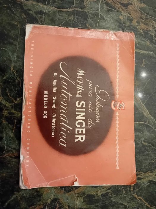 Maquina de  costura marca singer