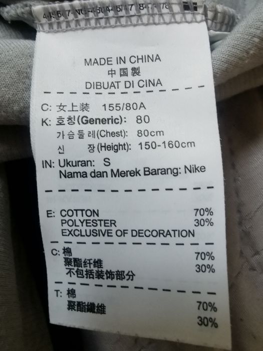 Bluza Nike r. S Asymetryczna, z tyłu dłuższą, zapinana na zamek