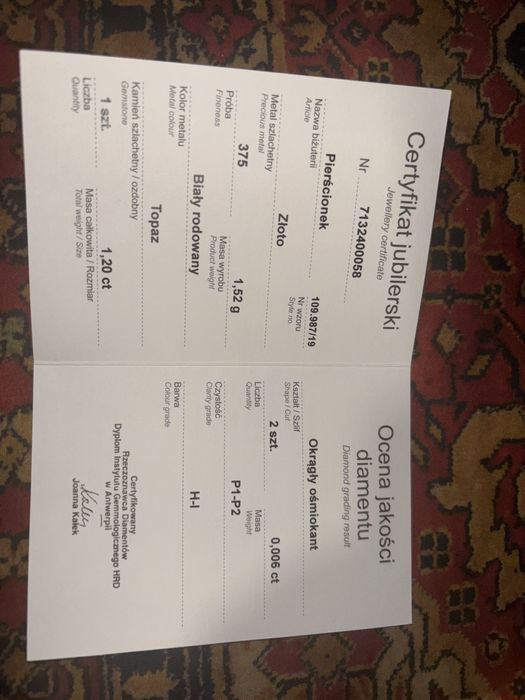 Pierścionek zaręczynowy-Białe złoto, topaz, diamenty po bokach