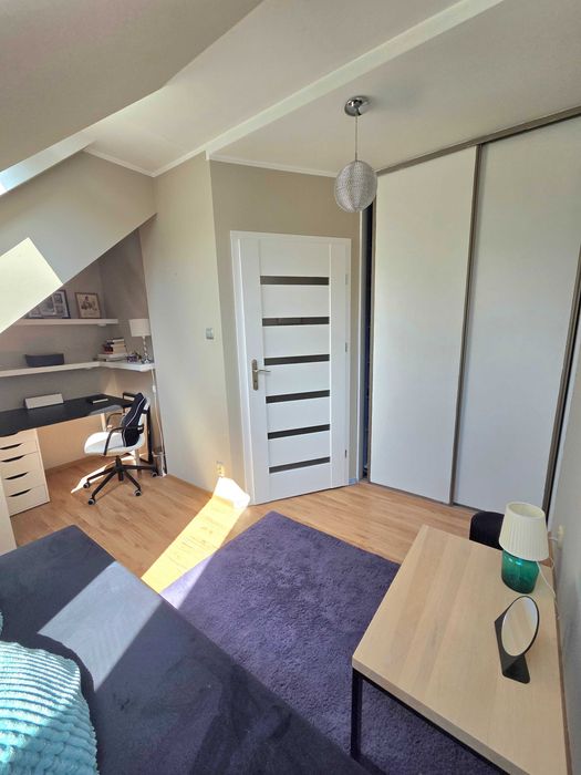 Dom w Mrągowie 95 m2 w zabudowie szeregowej z ogrodem i wiatą garażową