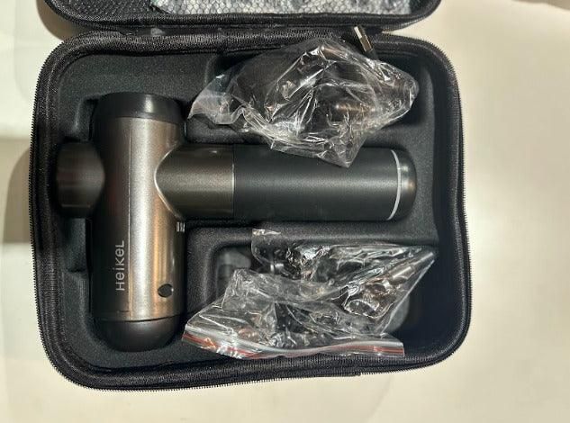 Pistola de massagem com estojo (+ cabeças)