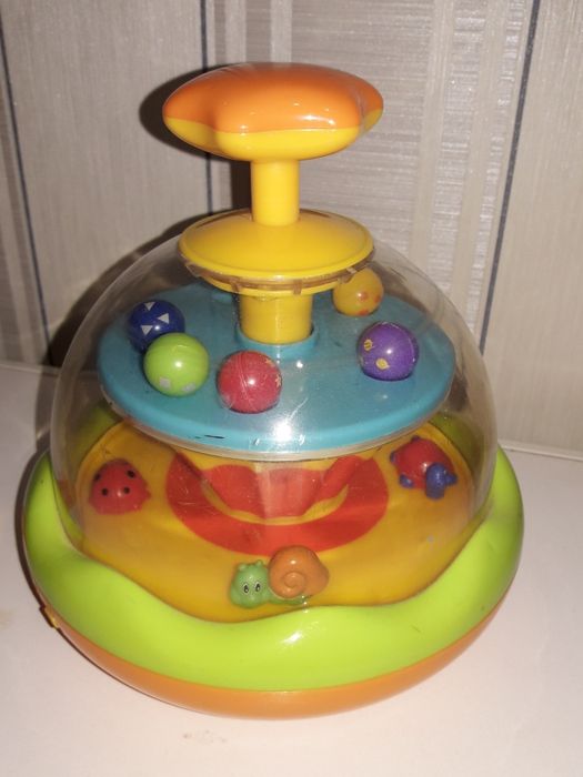 Музыкальная юла kiddieland и черепашка Chicco