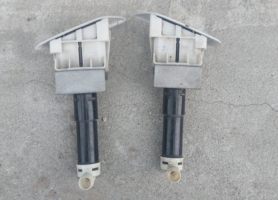 Форсунки Омивачів фар з Мазди 3,6.Cx3,5