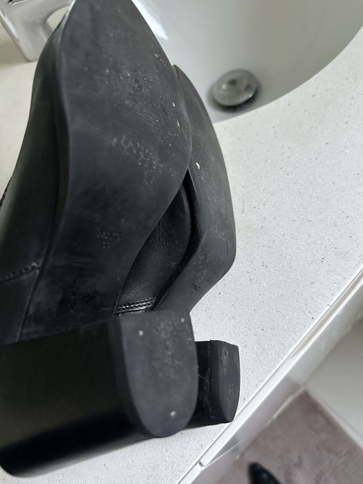 Botas em pele, pretas