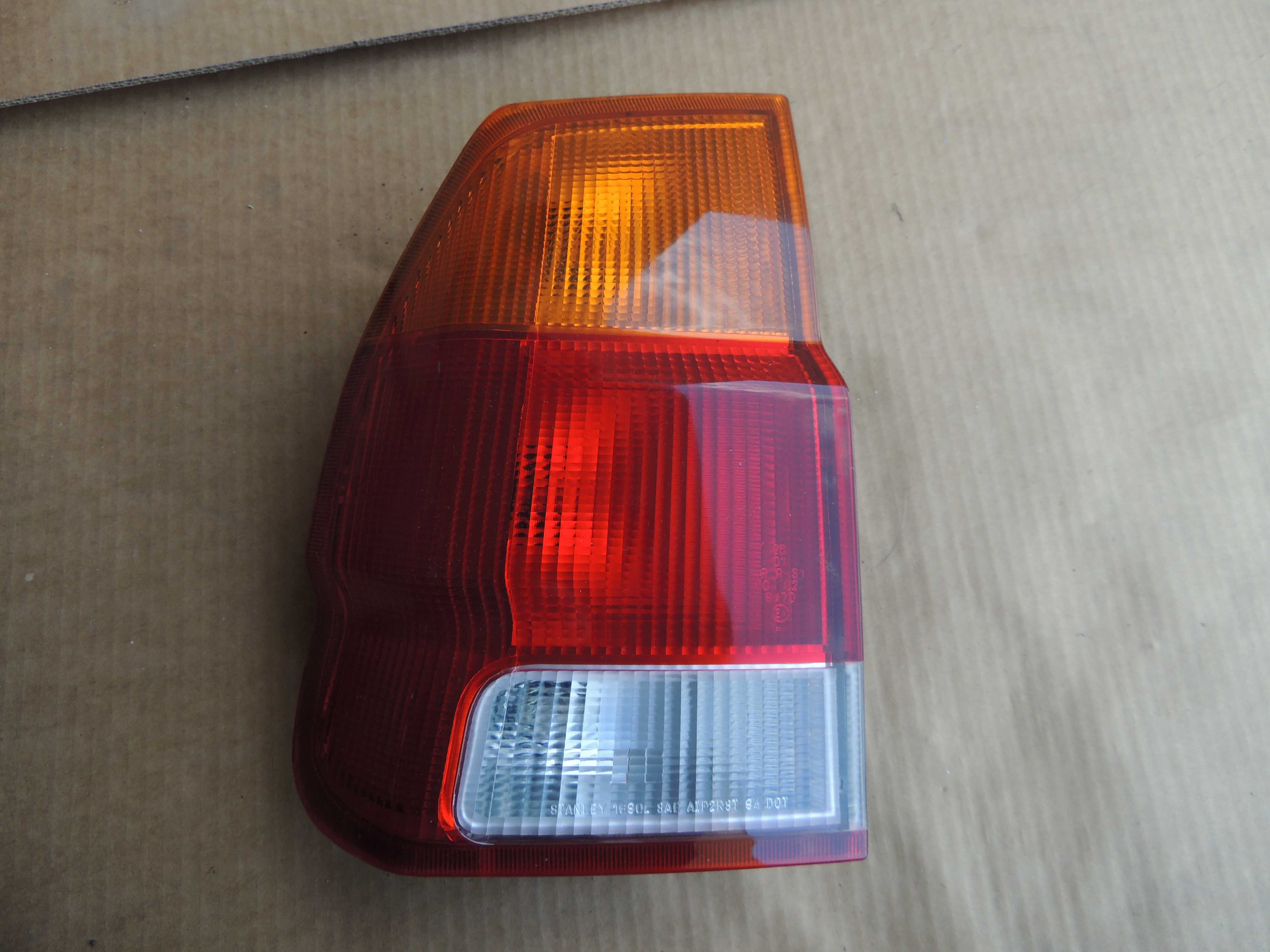Lampa tył tylna lewa europejska Mitsubishi Pajero Sport Challenger 1 I