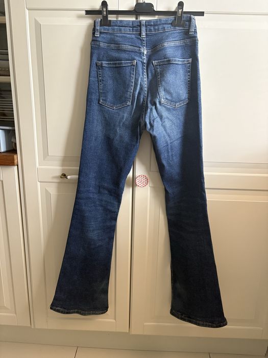 Jeansy wysoki stan flare rozm. 34