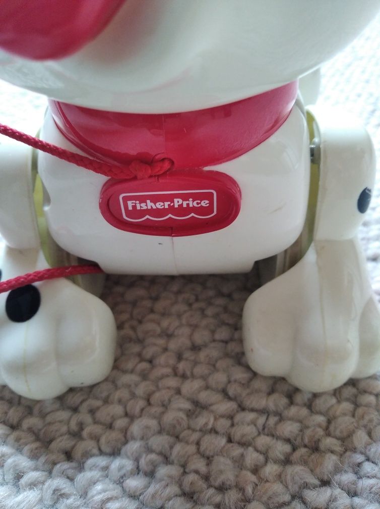 Piesek Fisher Price do ciągania na sznurku