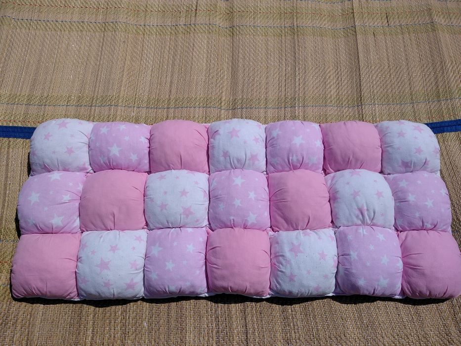 Бортики в ліжко для дівчинки