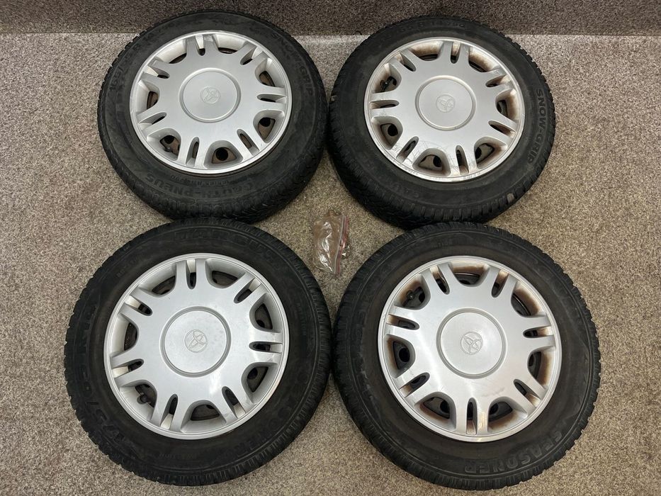 Kola felgi opony ZIMA kolpaki nakretki R14 4x100 5.5J ET49 Toyota Yaris I