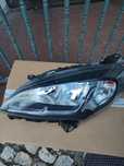 Farol esq Fiat doblo