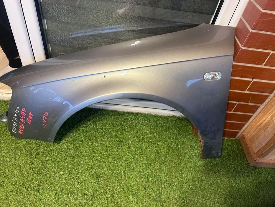 audi a4b7 błotnik lewy kod lakieru: ly7g